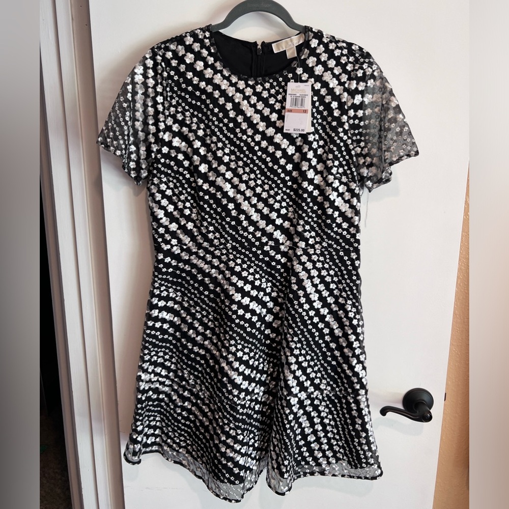 Michael Kors dress size 12, embroidered like flowers.